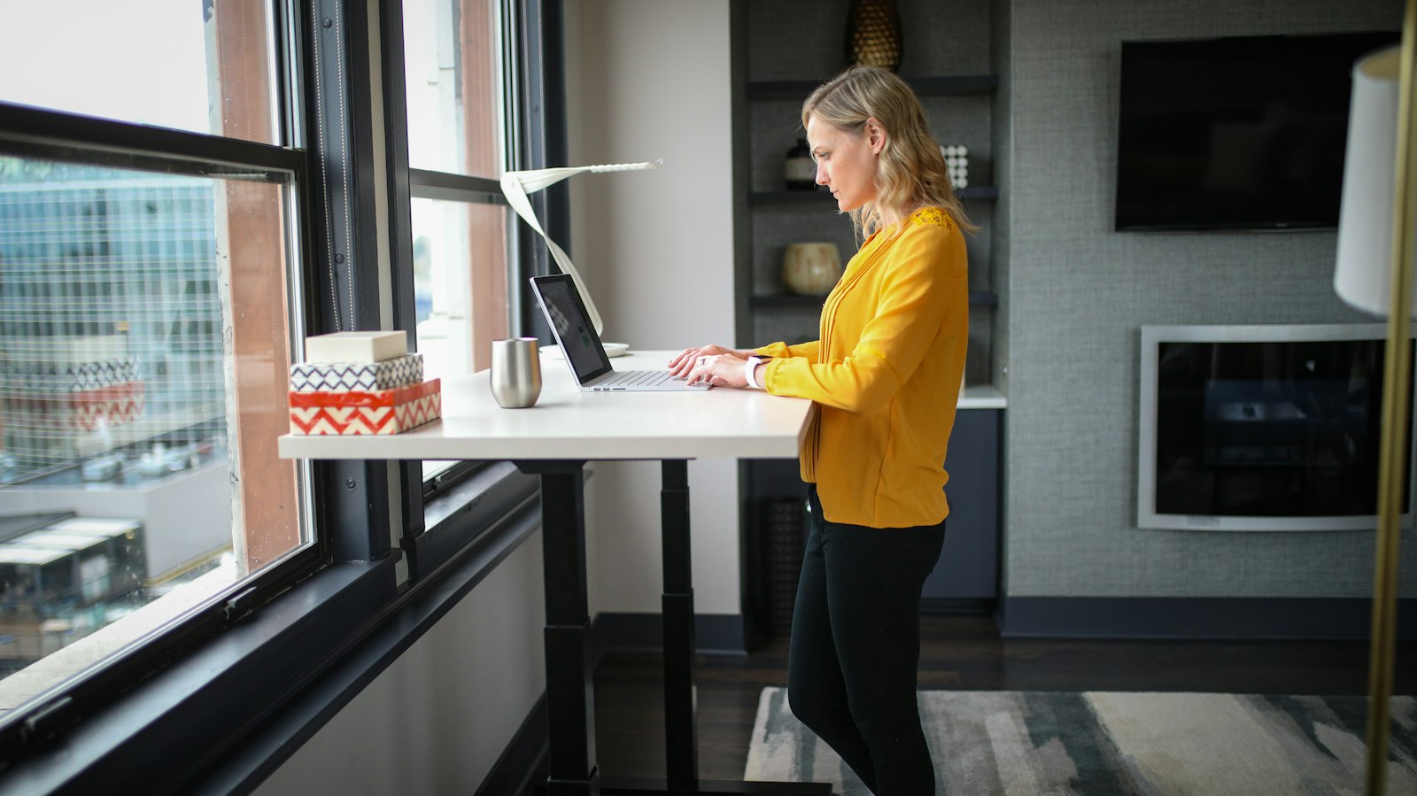 Person alternating between sitting and standing